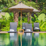 Umbrella And Chair Around Outdoor Swimming Pool Nearly Sea Beach Umbrella And Chair Around Outdoor Swimming Pool Nearly Sea Beach
